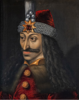 Portrait of Vlad III the Impaler wearing a jeweled hat and red cloak