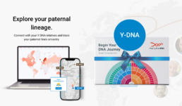 Y-DNA test kit beside laptop and phone showing paternal haplogroup results and migration map.